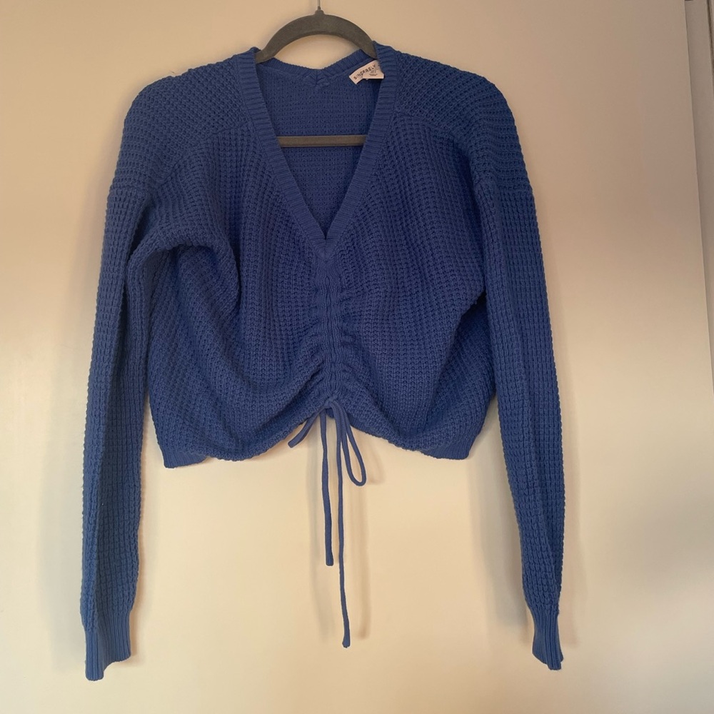 Blue cropped front cinch sweater